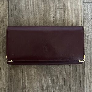 INTERNATIONAL WALLET WITH GUSSETS, MUST DE CARTIER